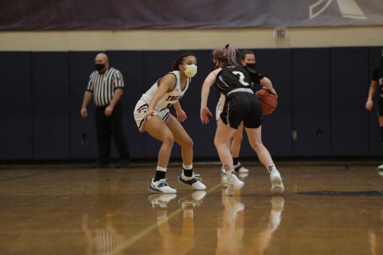 Girls’ Hoops Recap: Staunch Defense Propels No. 2 Trojans Over Okemos, 62-21