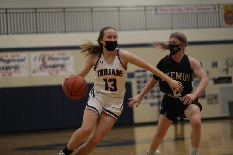 Defense, Payton Baker Spark No. 2 Trojans in 49-30 Win Over Haslett